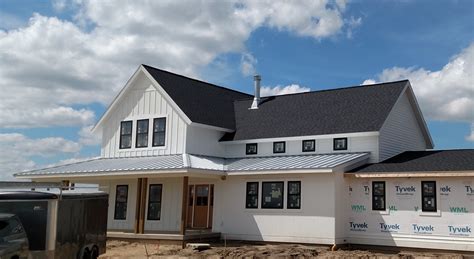 white metal roof dark house|white house with galvalume roof.